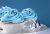 15555782-cupcake-dessert-with-blue-icing-frosting-and-silver-ball-decorations.jpg