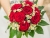 Strauss rote rosen und margeriten.jpg
